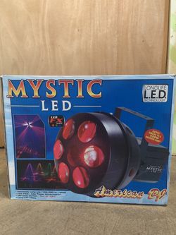 Dj lights, fog machine, and numark cd mixer with case.