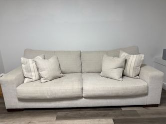 Cream Fabric 2-Seater Sofa with Throw Pillows
