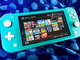 switch lite with 128 micro sd and few games on it
