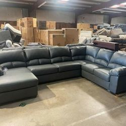 Aberton Gray Faux Leather Sectional Financing Available By ASHLEY 