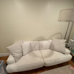 White Fabric Sofa With Throw Pillows 