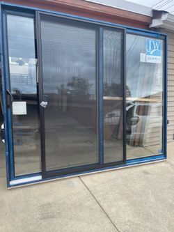 New patio door vinyl black outside white inside size w  95.1/2 h 79.1/2 $1075