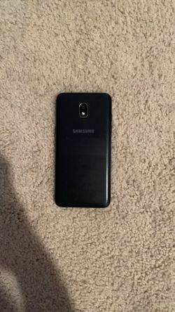 Samsung Galaxy J3 with long charger