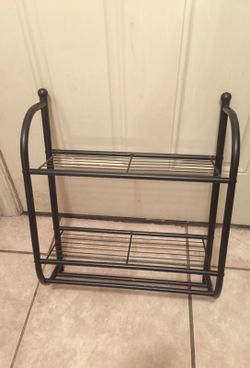 Black over the toilet towel rack