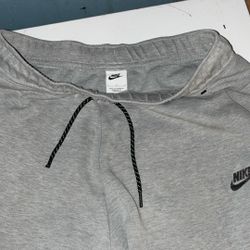 Nike Tech Pants  (large)