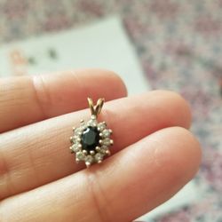 9 Crate gold With Zircon And Sapphire. Pendant Only