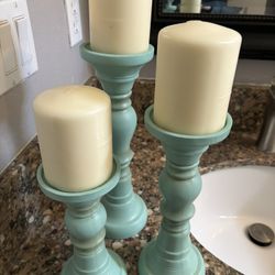 3 Candlesticks with candles
