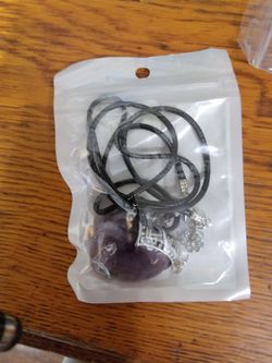 Brand new amythst heart shaped necklace with black chain