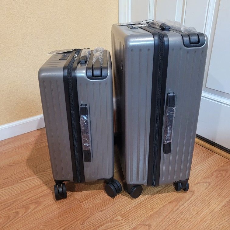 VELOCI Luggage Set 22 in 18 in Suitcases. NEW. Size: 23×17×9.5 and 19.5×14×9
