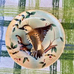 Two vintage style ceramic wall pockets featuring 3D birds