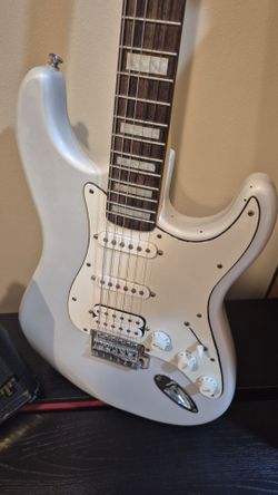 electric guitar with amplifier ( partscaster)