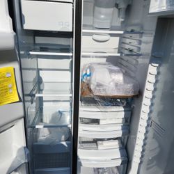 A new GE brand 2-door refrigerator measuring 36 inches wide by 69 inches high by 24 inches deep.