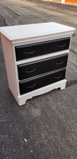 White dresser with black drawers