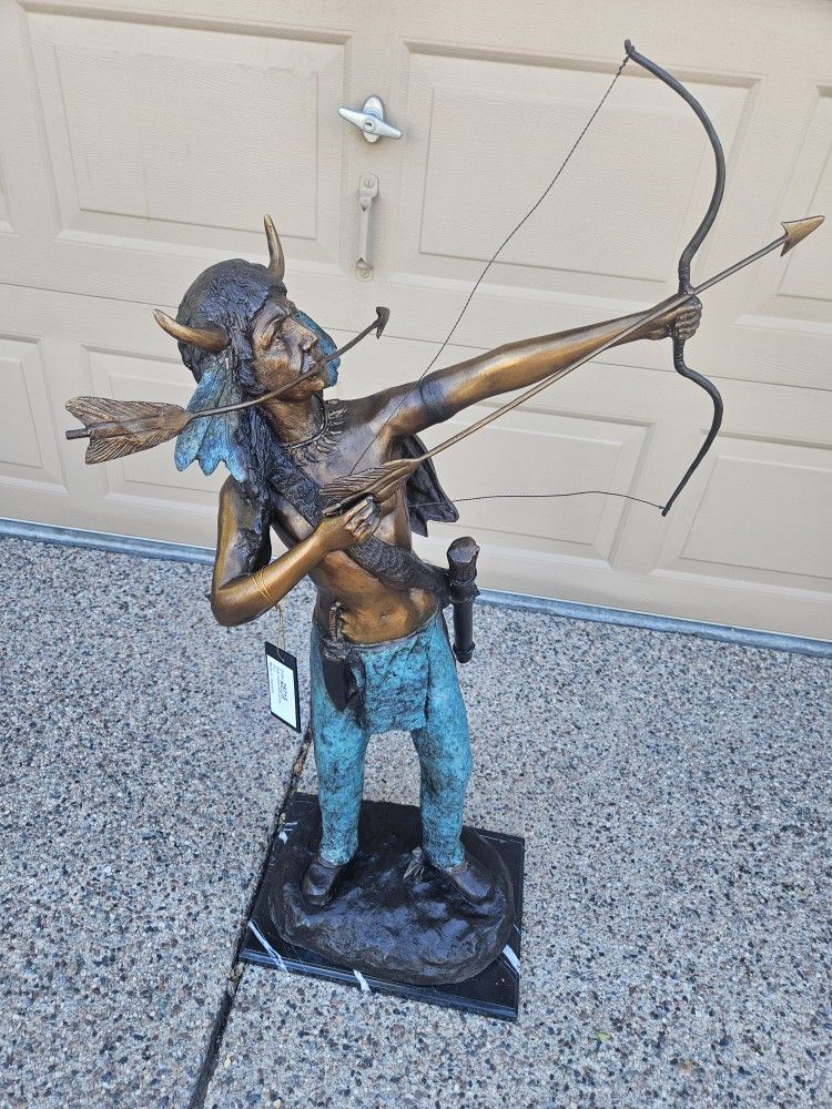 Bronze statue of Indian With bow and arrow on marble base