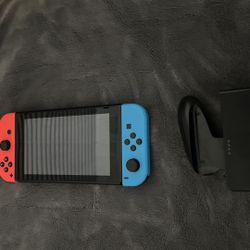 Nintendo Switch With Controller Grip