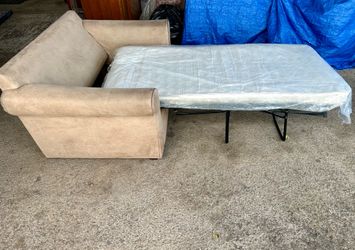 Living Spaces Sofa Chair with pull out twin memory foam mattress