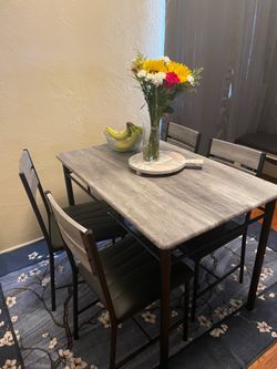 Brand new small dinning  table and chairs