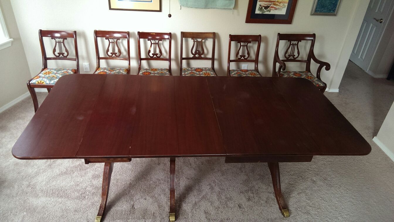 Mahogany Extensole drop leaf dining room table and six chairs