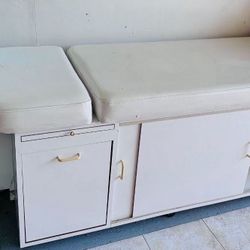 Facial or massage bed with cabinets