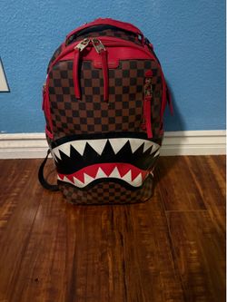 Spray ground backpack