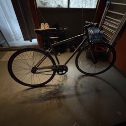 Grey frame with brown saddle and handlebar grips Concord