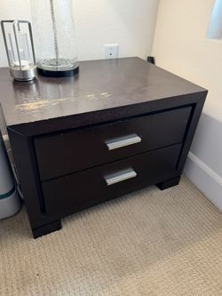 2 Dark brown wooden nightstands