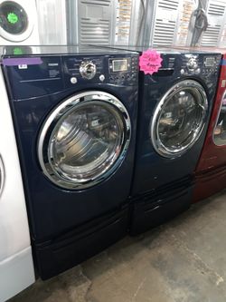 LG front load washer & electric dryer with pedestals in excellent conditions with 4 months warranty
