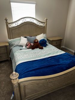 Queen bed with box spring mattress and two nightstands