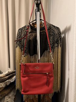 Red Kate Spade crossbody purse