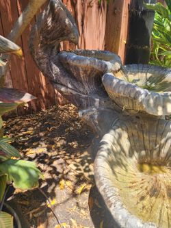 Outdoor water fountain with pump