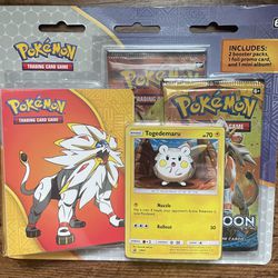 Sealed 2017 Pokemon TCG Sun and Moon Mini Portfolio blister package with 2 Sun & Moon Booster Packs, album and holo promo card