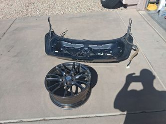 2007 Infiniti G35 trunk & wheel.
