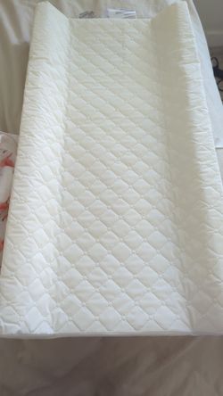 Contoured baby changing mat and cover