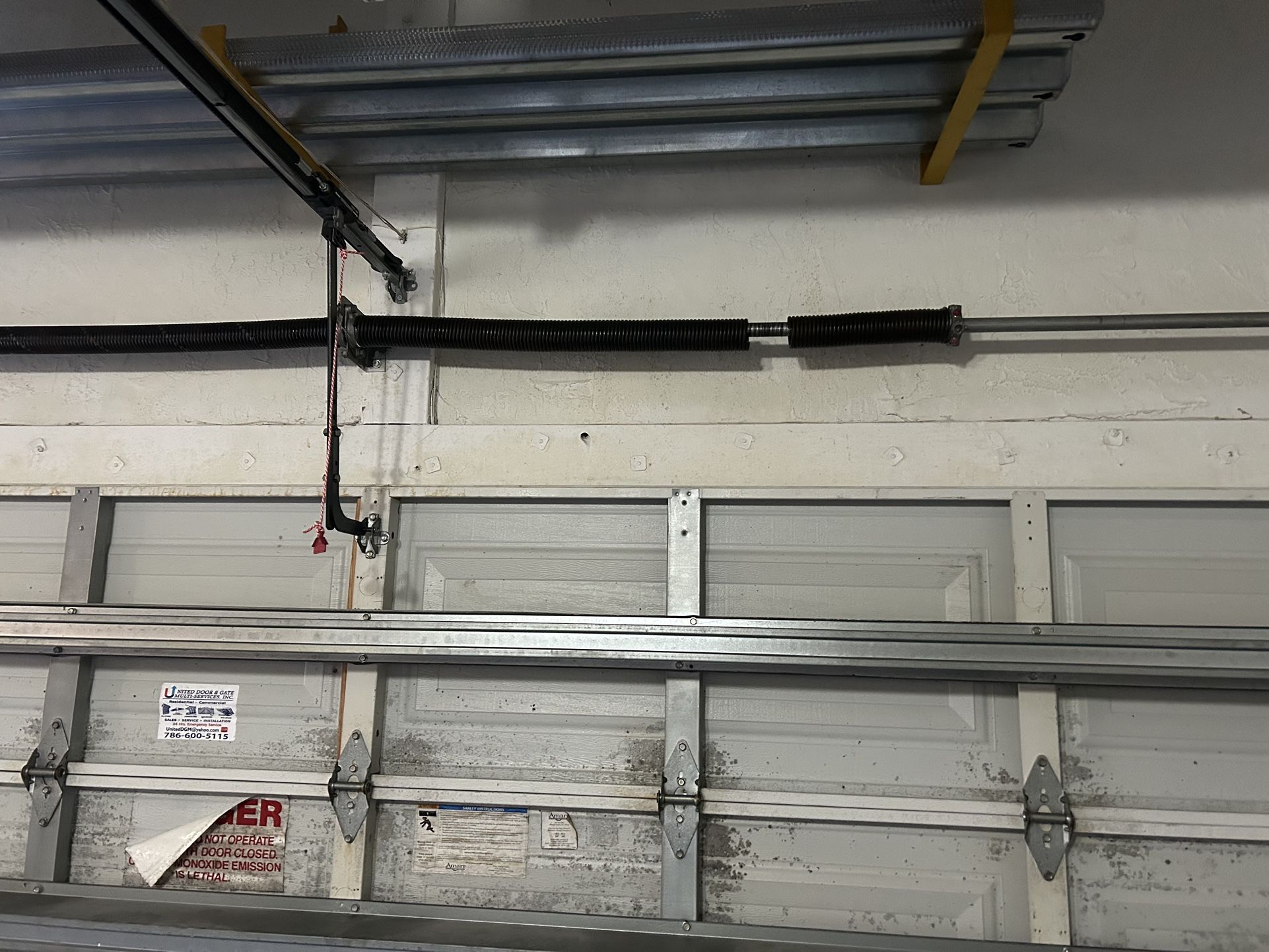 Garage Door Spring Adjustment And Replace