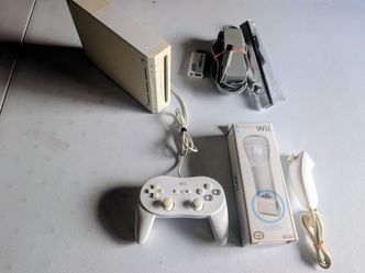 Nintendo Wii Bundle Preloaded With Games and Pokemon Movies