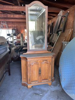 Hall cabinet or dry bar.