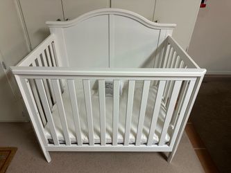 Delta children mini crib