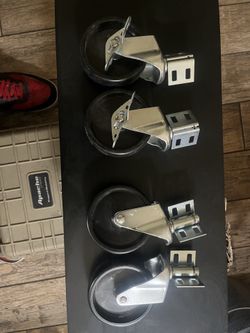 4 250lb set of casters with plastic wheels