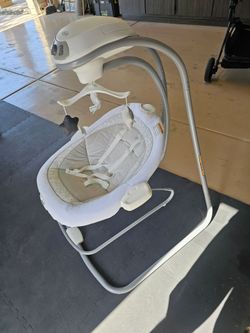 This is a Graco DuetConnect LX Swing and Bouncer in a beige color.
