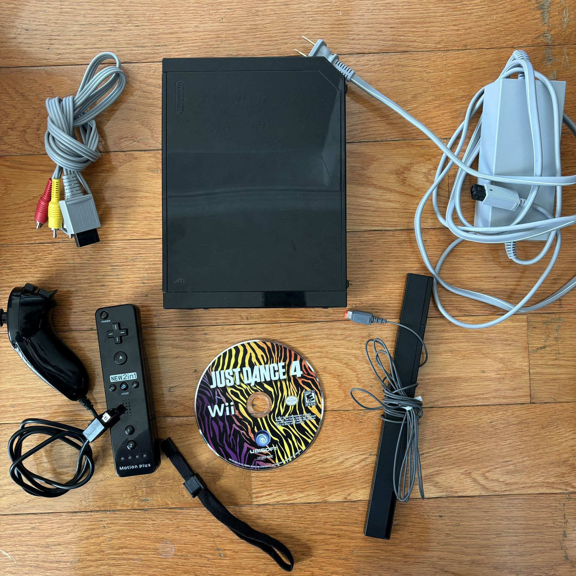 Nintendo Wii Console w/ Wiimote Nunchuck Cables And Just Dance 4