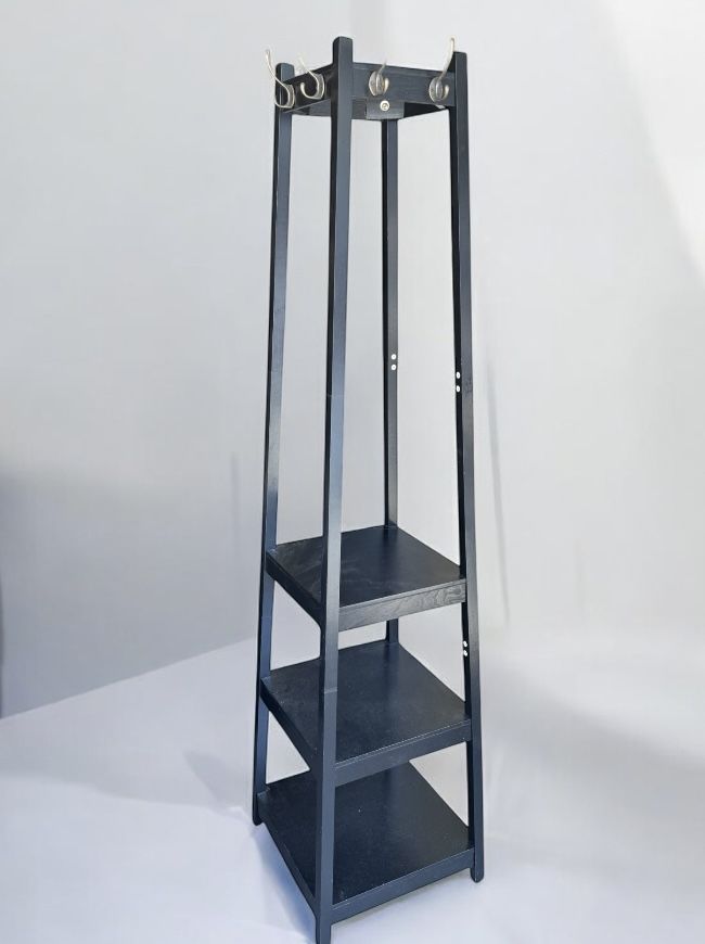 Black 3 tier garment coat rack . 