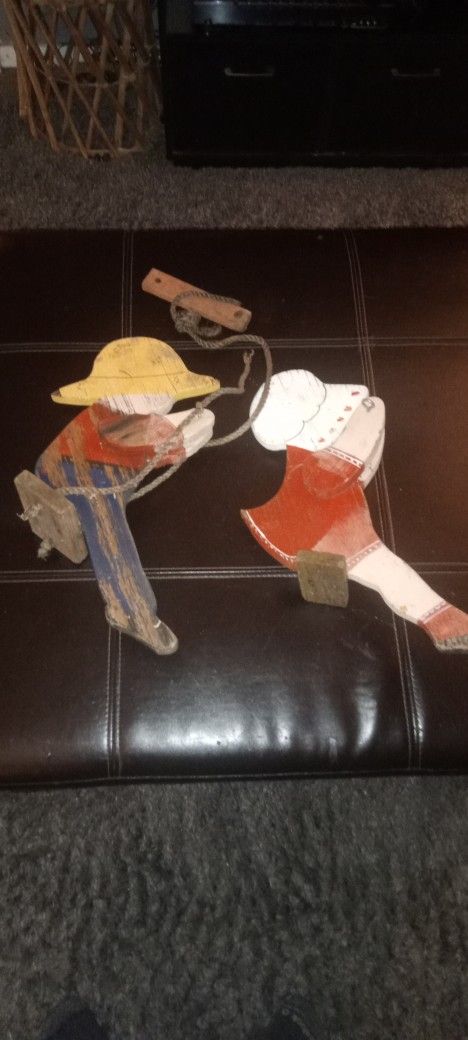 TREE/ GARDEN ART OF BOY & GIRL ON SWING
-WOODEN ART WHER THE BOY AND GIRL SWING FROM A TREE
