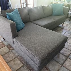 Large gray L-shaped couch