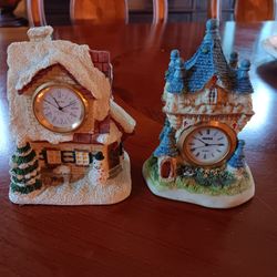 Two Miniature British Countryside Buildings Each Containing A Clock
