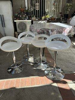 Glass Top Table & 4 Swivel Counter Stools