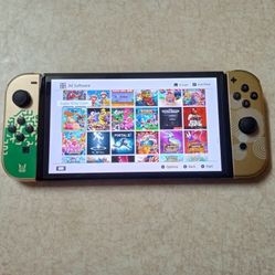 NINTENDO SWITCH OLED MOD with 125 SWITCH GAMES