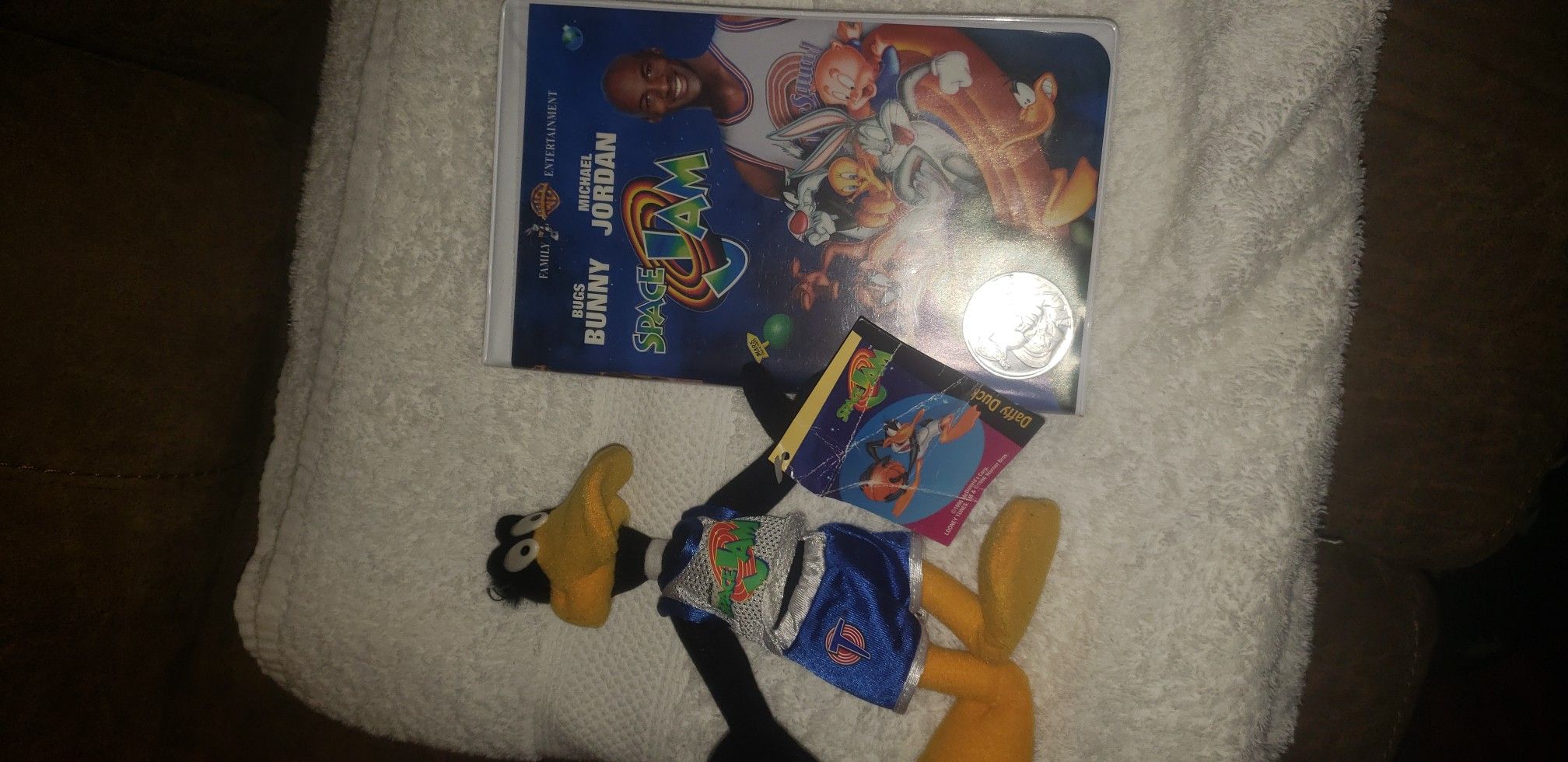 Space Jam VHS w/Coin and Daffy Toy