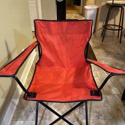 Red fold up chair