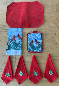Holiday towel, placemat, pot holder and 4 cloth napkins.