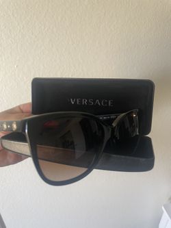 Versace sun glasses. Worn a few minutes only.